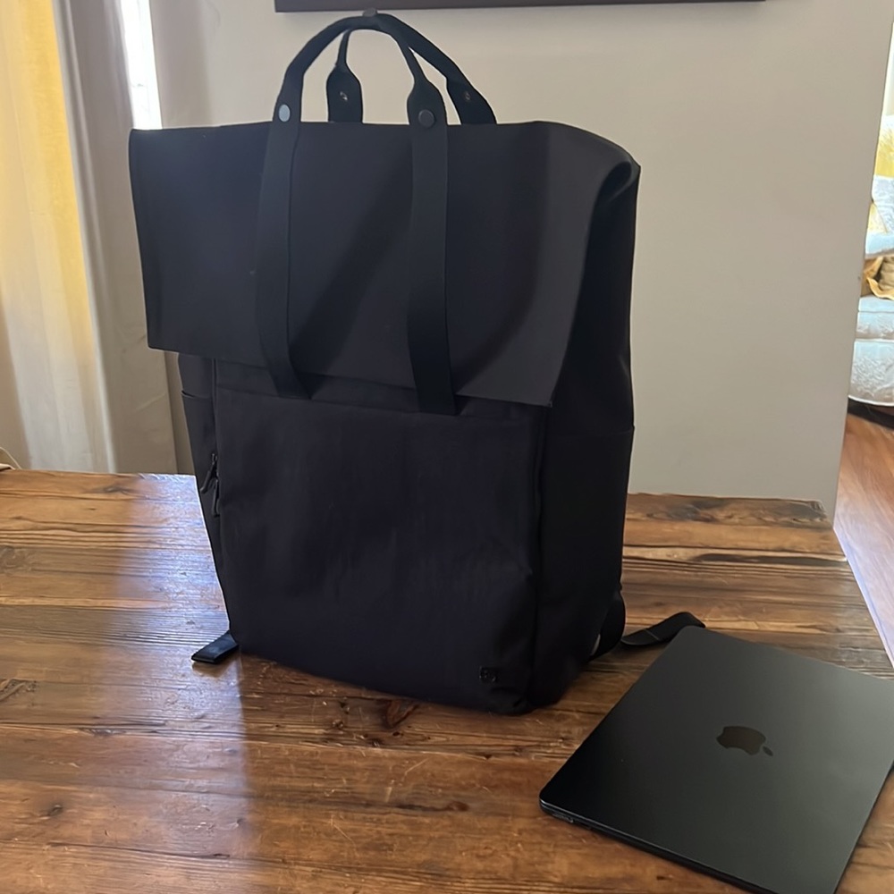 Lululemon black canvas backpack Water repellent fabric. Only used a few times